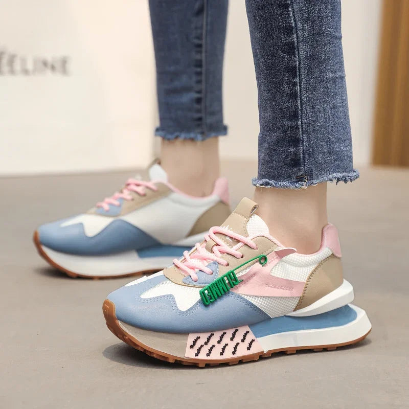 Retro pastel sneakers with neon accents and mesh sides