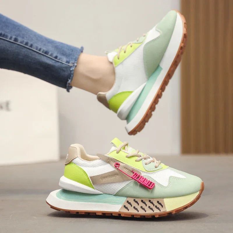 Retro pastel sneakers with neon accents and mesh sides