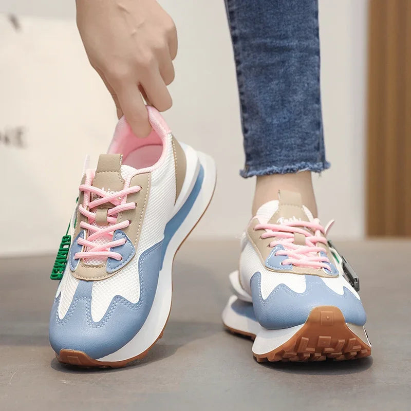 Retro pastel sneakers with neon accents and mesh sides