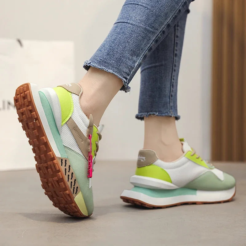 Retro pastel sneakers with neon accents and mesh sides