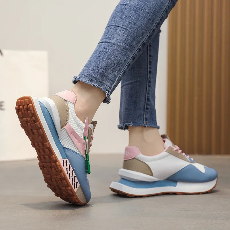 Retro pastel sneakers with neon accents and mesh sides