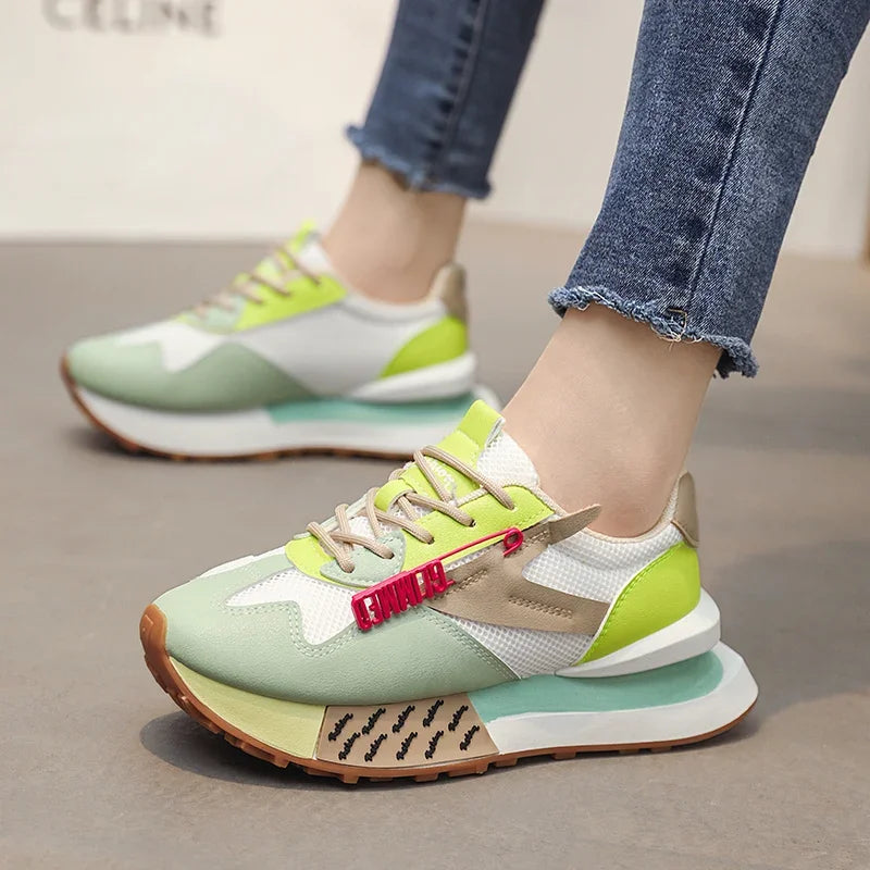 Retro pastel sneakers with neon accents and mesh sides