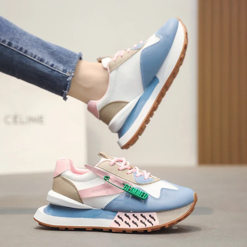 Retro pastel sneakers with neon accents and mesh sides