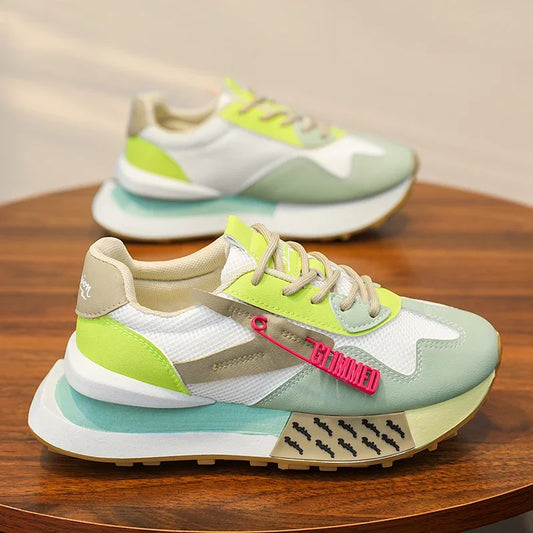 Retro pastel sneakers with neon accents and mesh sides