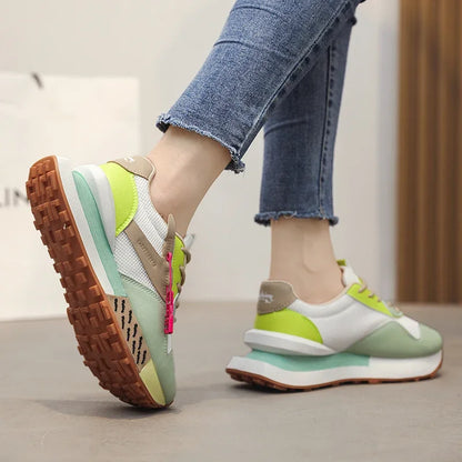 Retro pastel sneakers with neon accents and mesh sides
